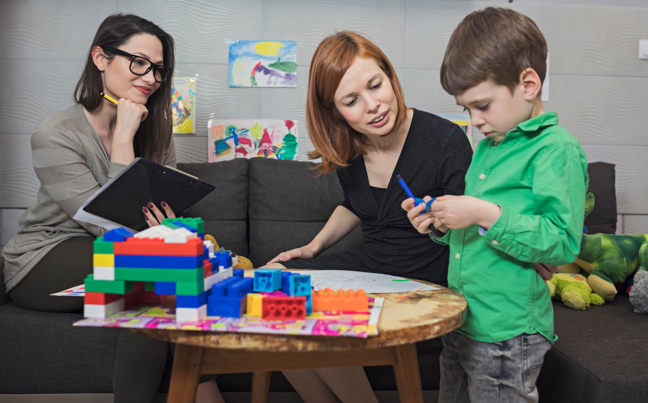 kid playing with legos