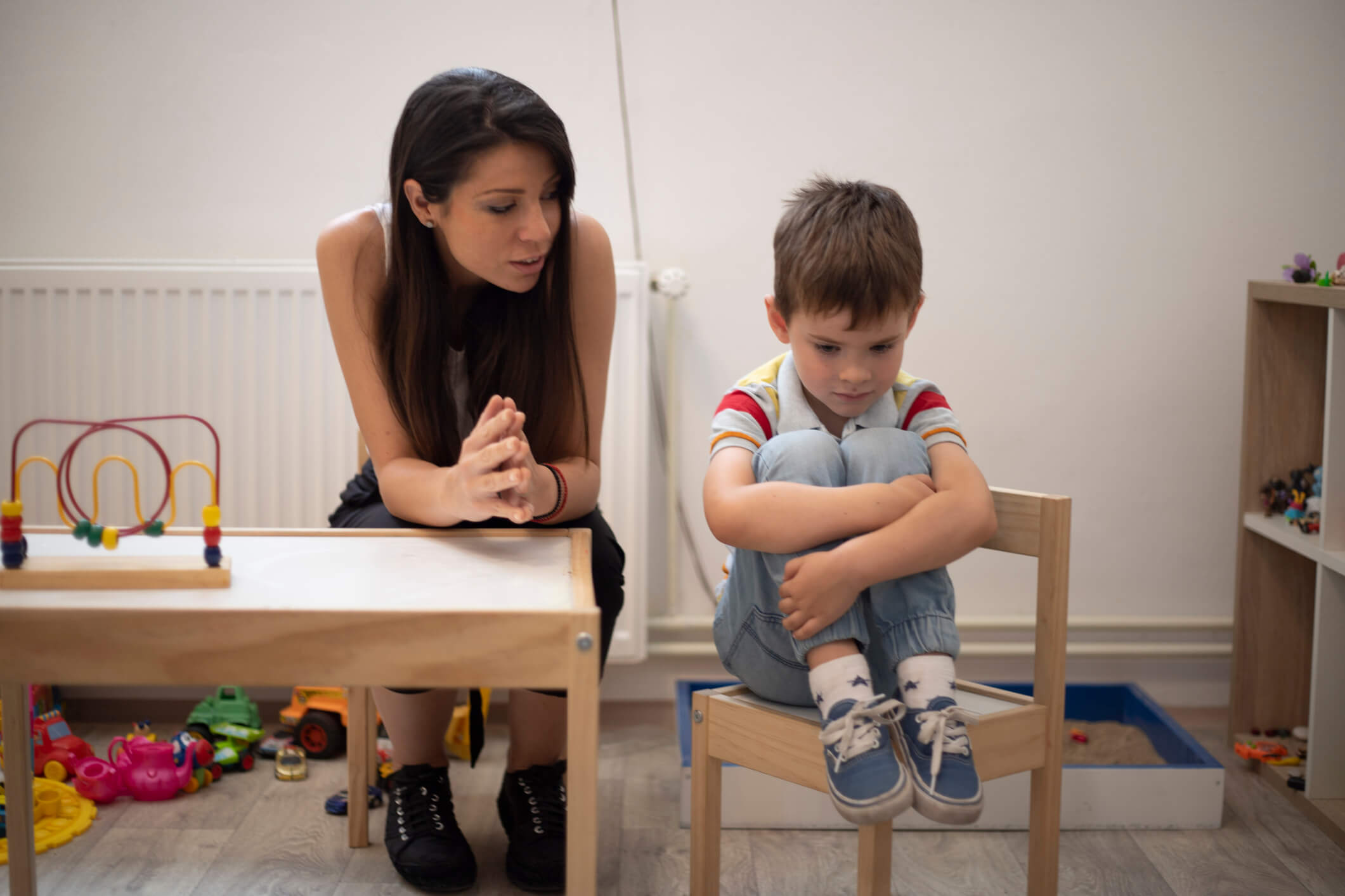 boy with therapist