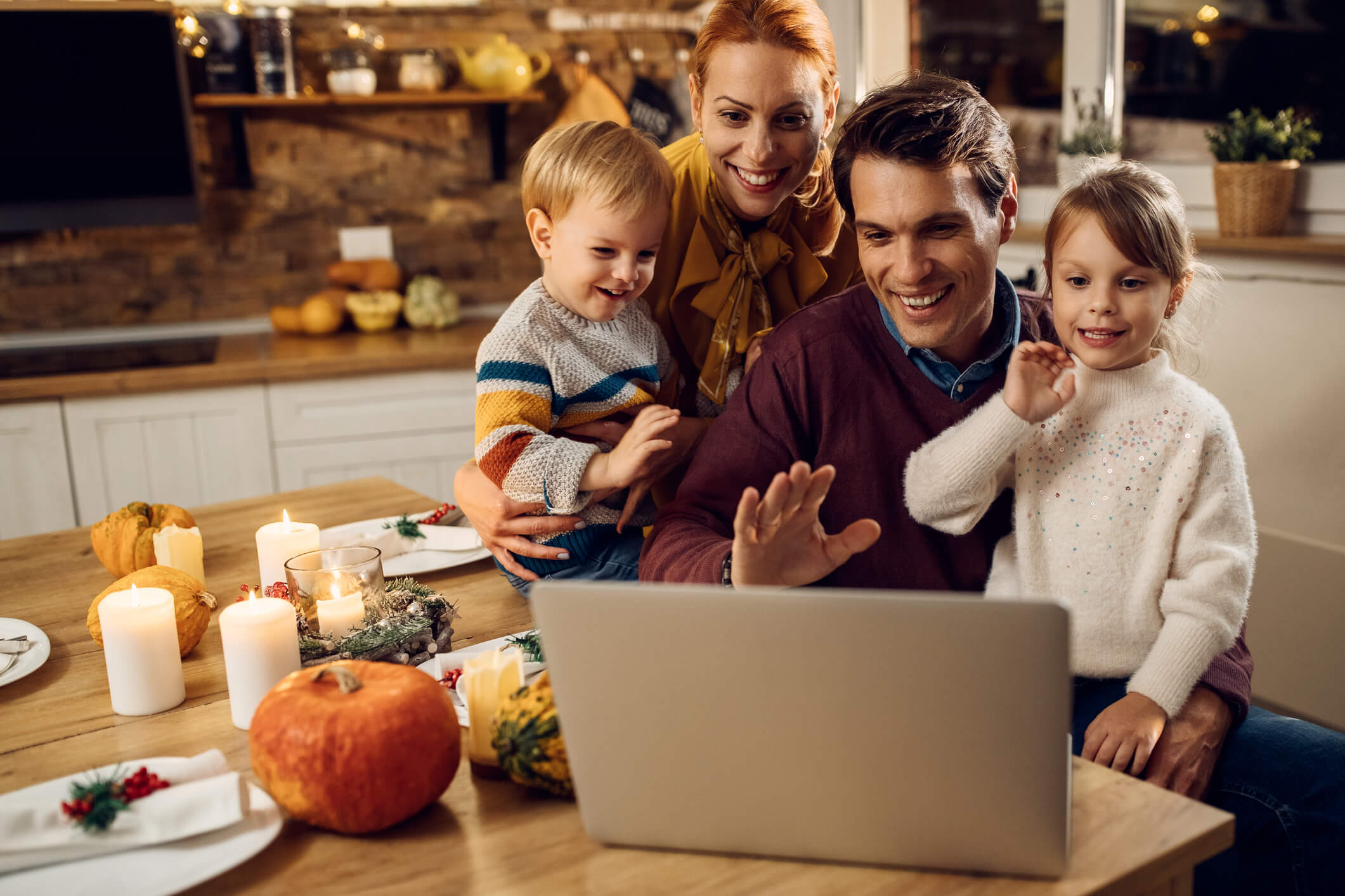 family surrounding table