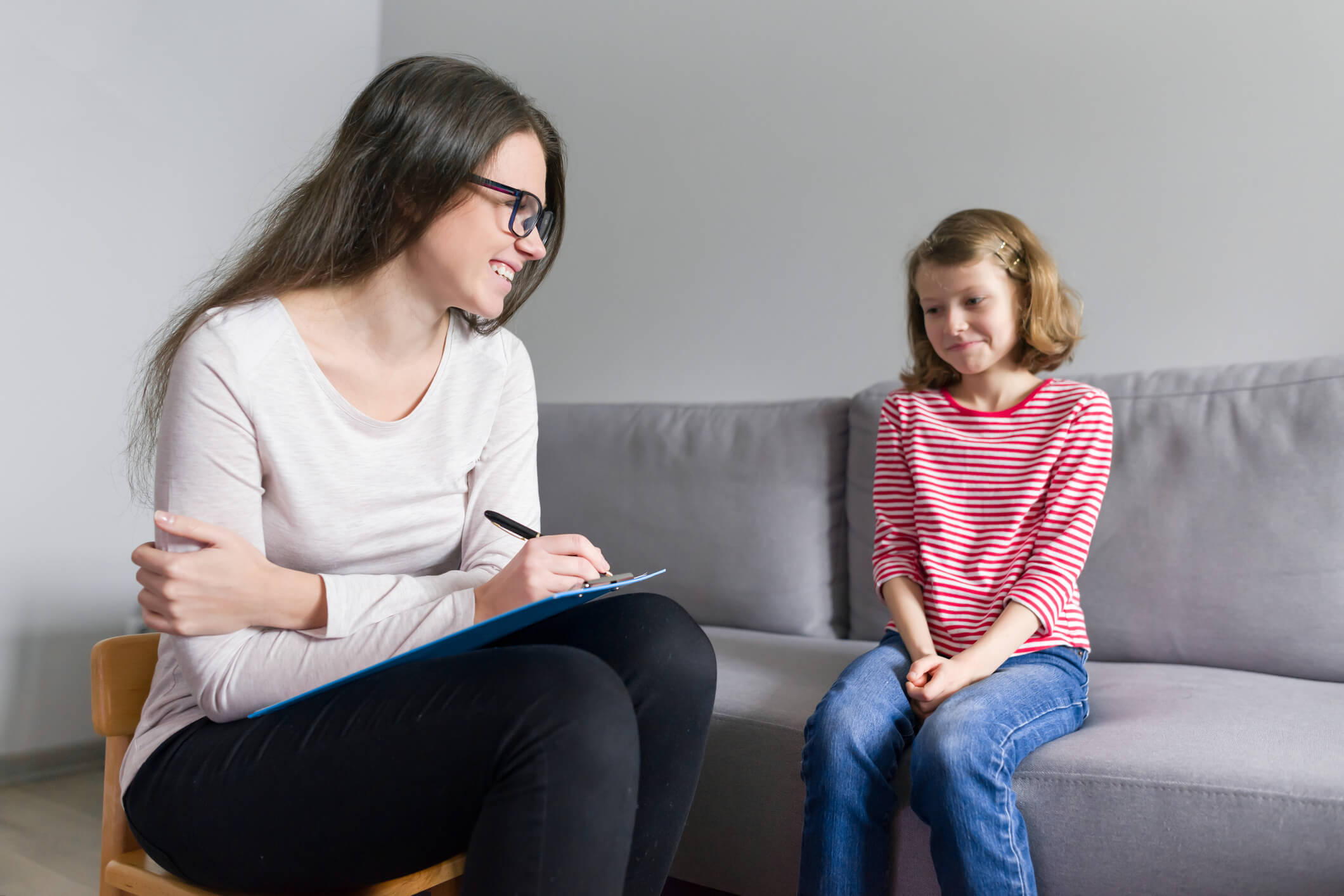 counselor talking a young girl