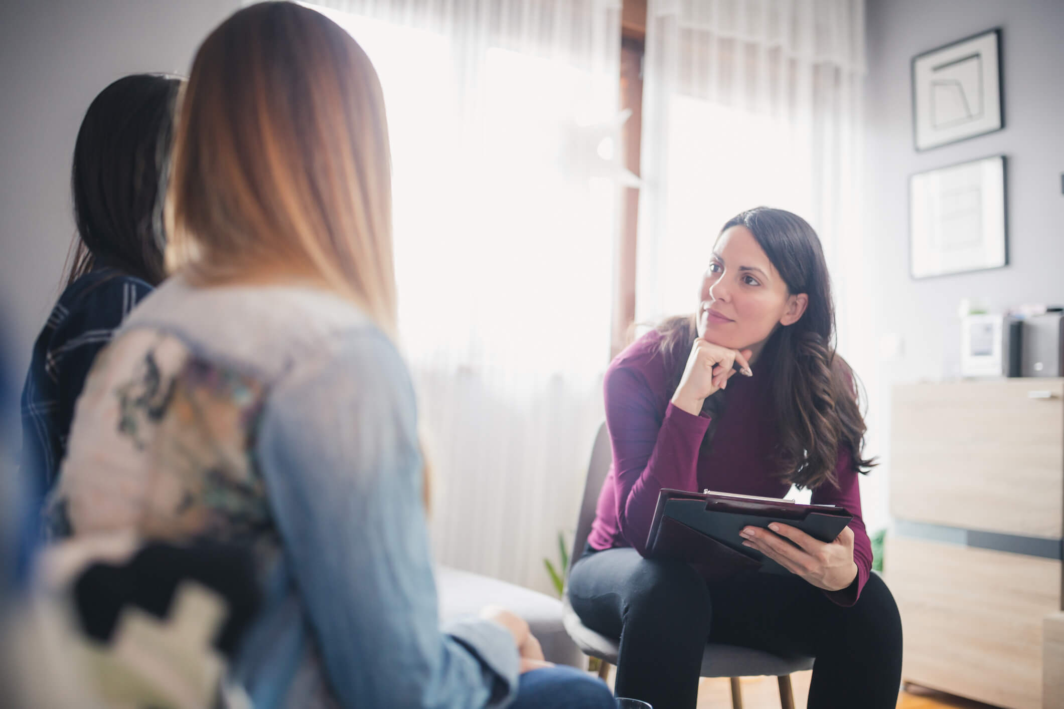 Women talking to patients