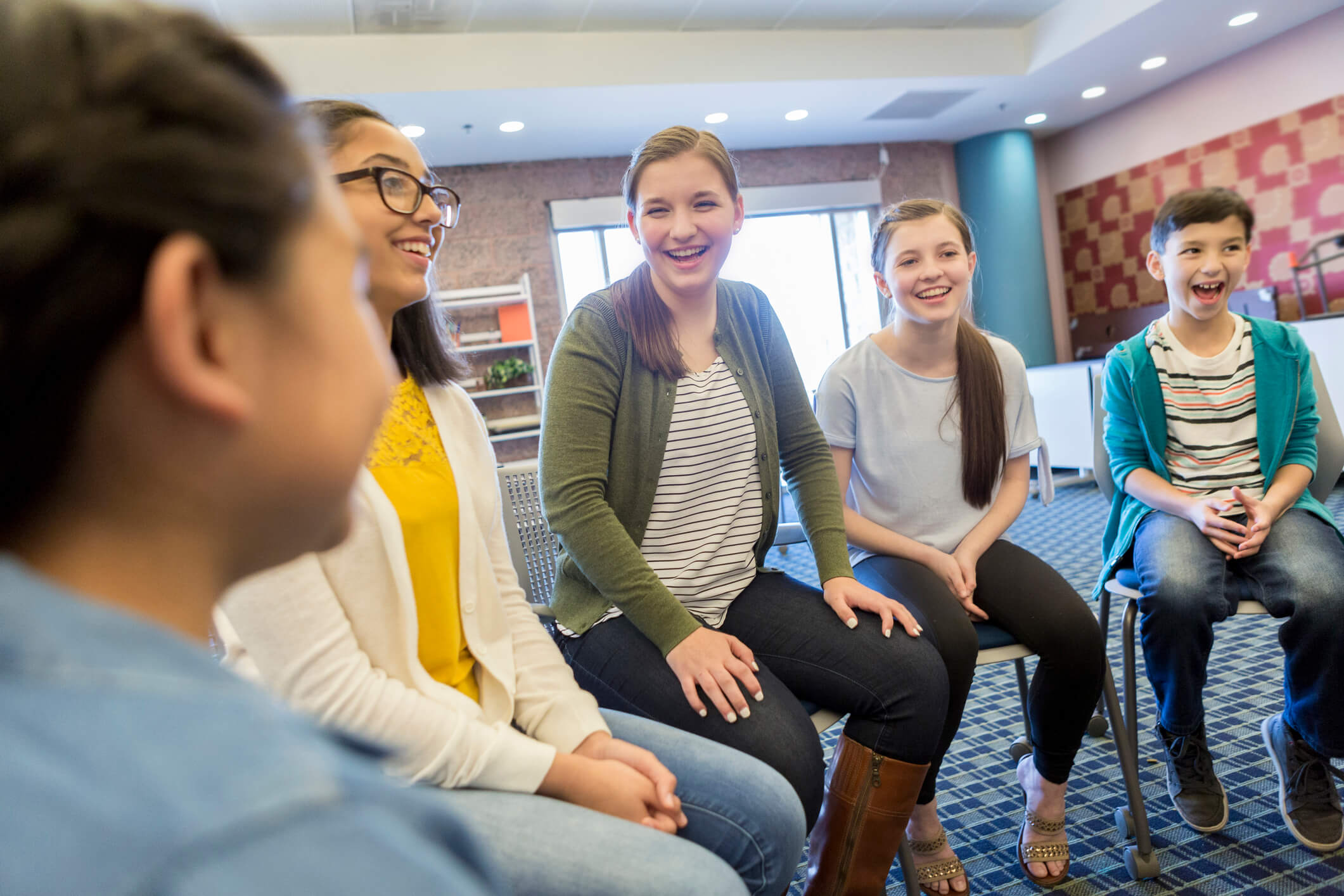 Group of schoolchildren participate in discussion